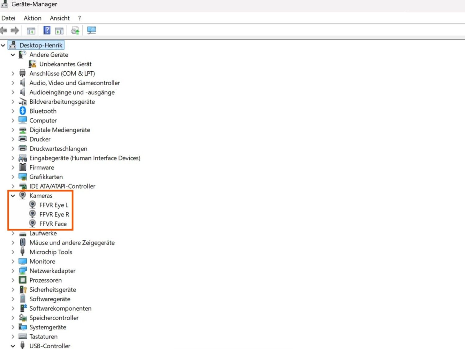 Device Manager showing three camera devices, confirming a successful installation
