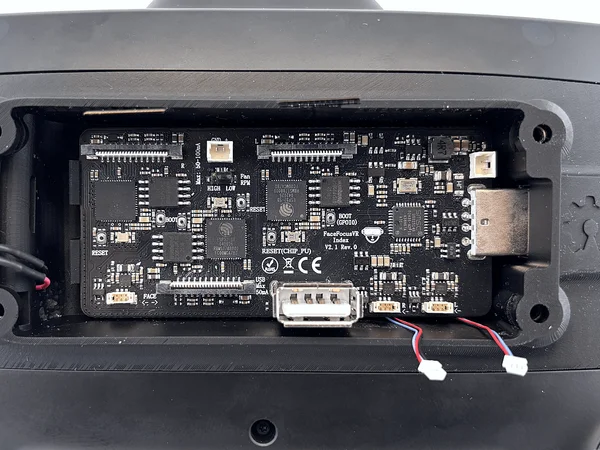 FaceFocusVR board being inserted into the USB connector at an angle