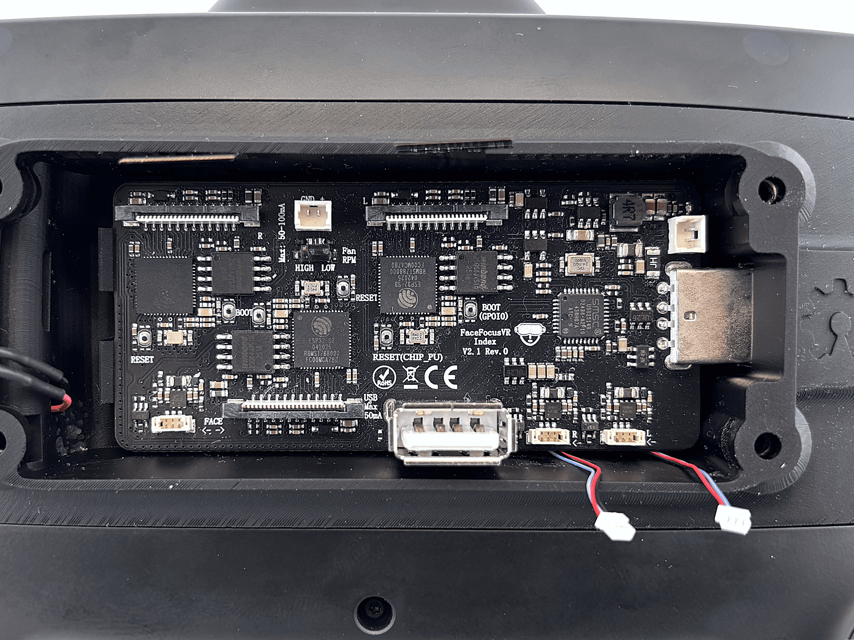 FaceFocusVR board being inserted into the USB connector at an angle