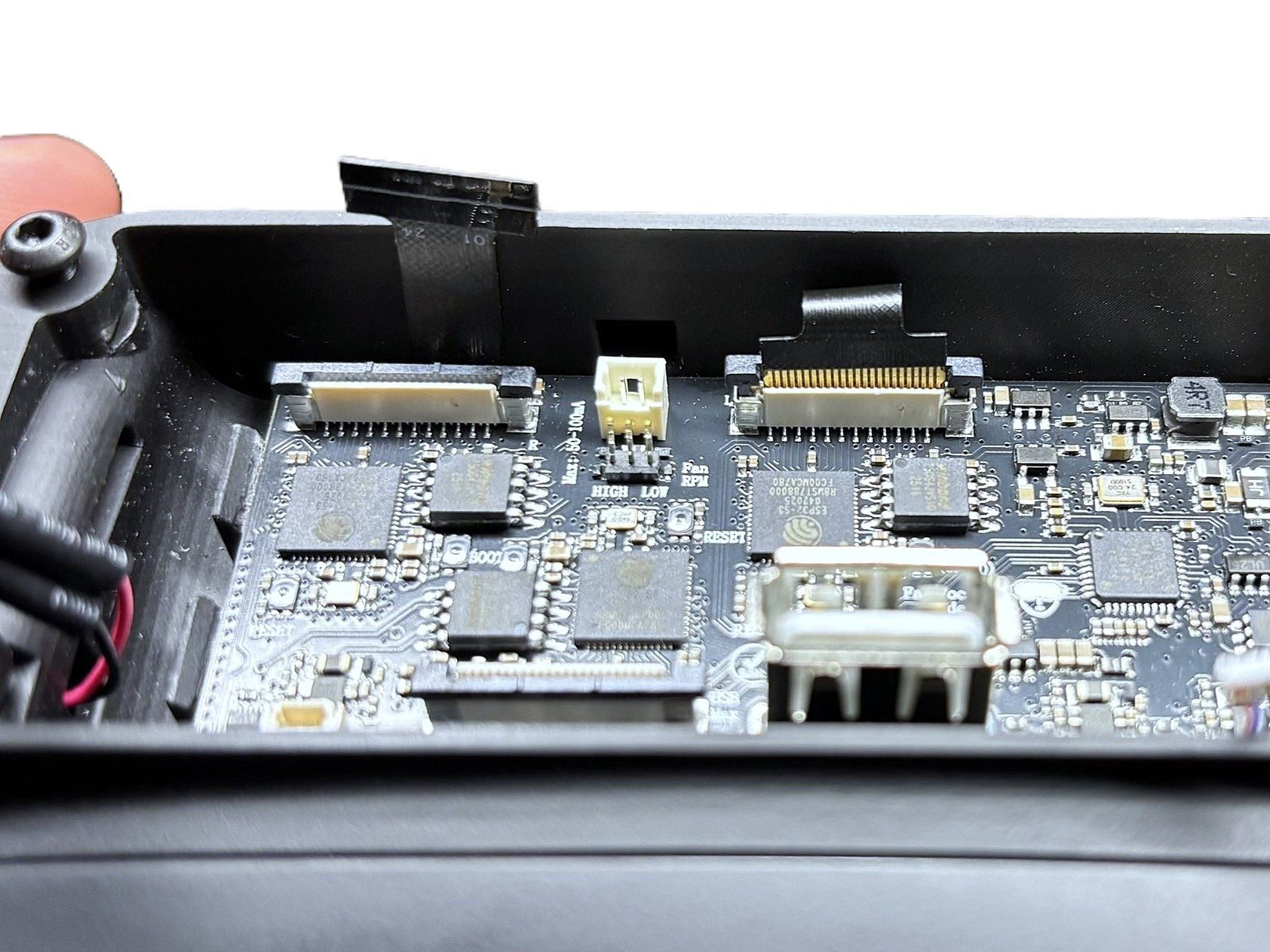 Ribbon cable gently bent and connected to the board