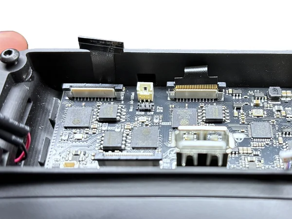 Ribbon cable gently bent and connected to the board