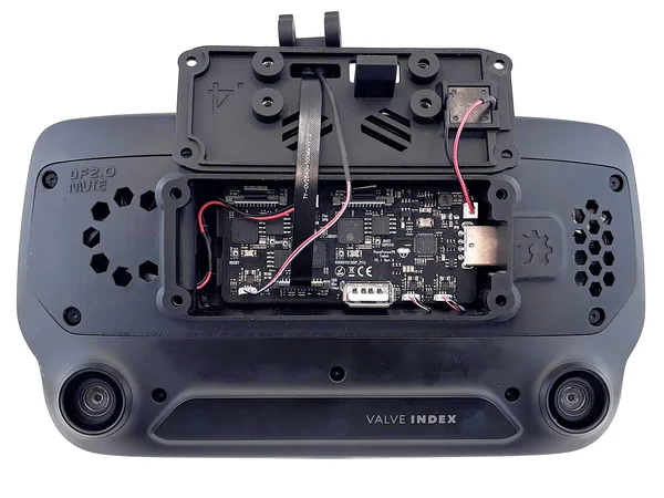 Face module fed through the front cover and connected to the board