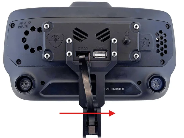 The Index seen from the front, with a red arrow showing the long screw going in from the left, through the face module, and into the nut on the right