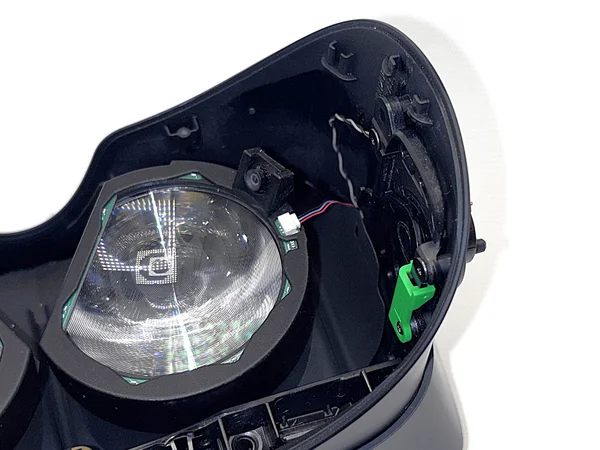 Eye module pressed onto the lens, excess cable pulled through