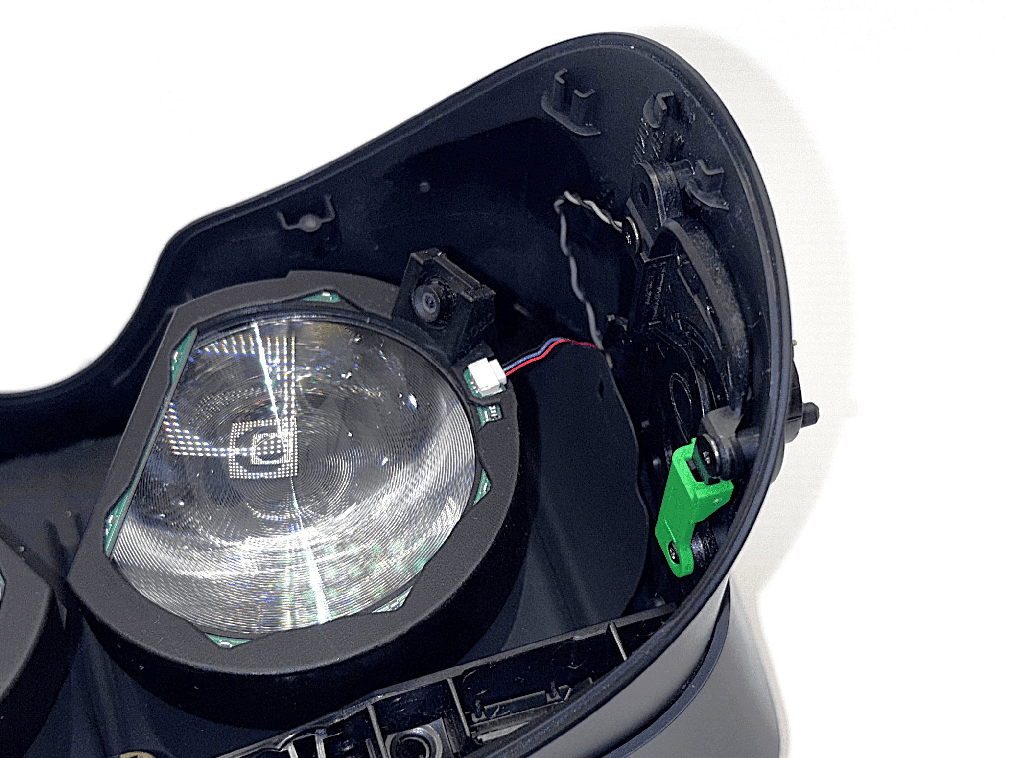 Eye module pressed onto the lens, excess cable pulled through